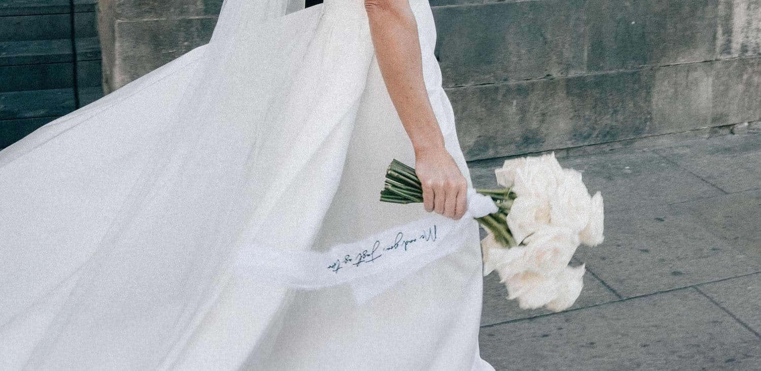 A wedding moment photographed by Tina Hevingham